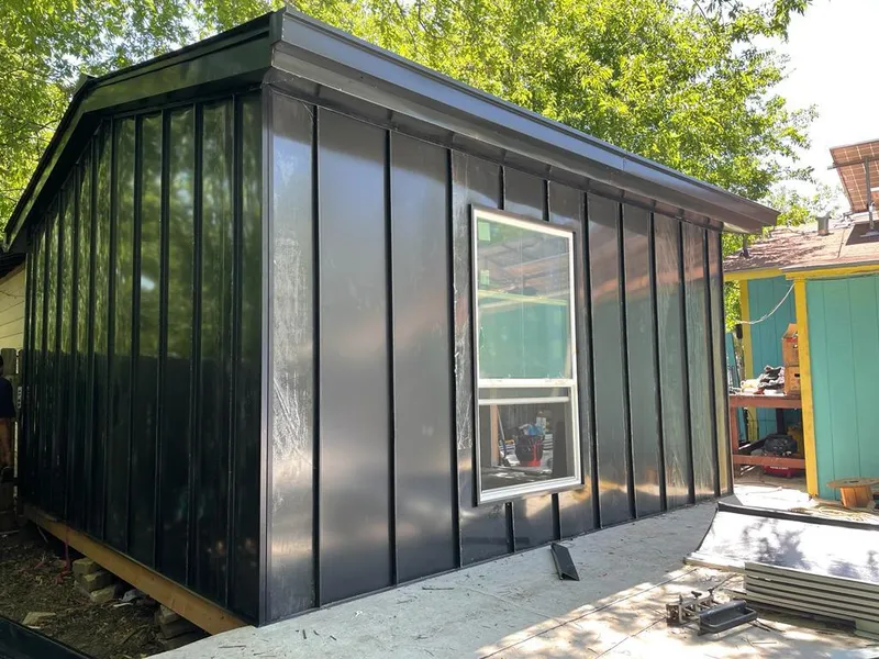 Black standing seam metal wall panels for Metal Roof Installation in Freeport